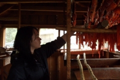 Salmon Camp 2016 - Kaitlyn Hangs Dry Fish