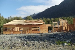 South or river side photo of JKCHC building in progress 8-10-13